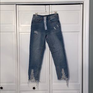 Blue jeans with white zipper